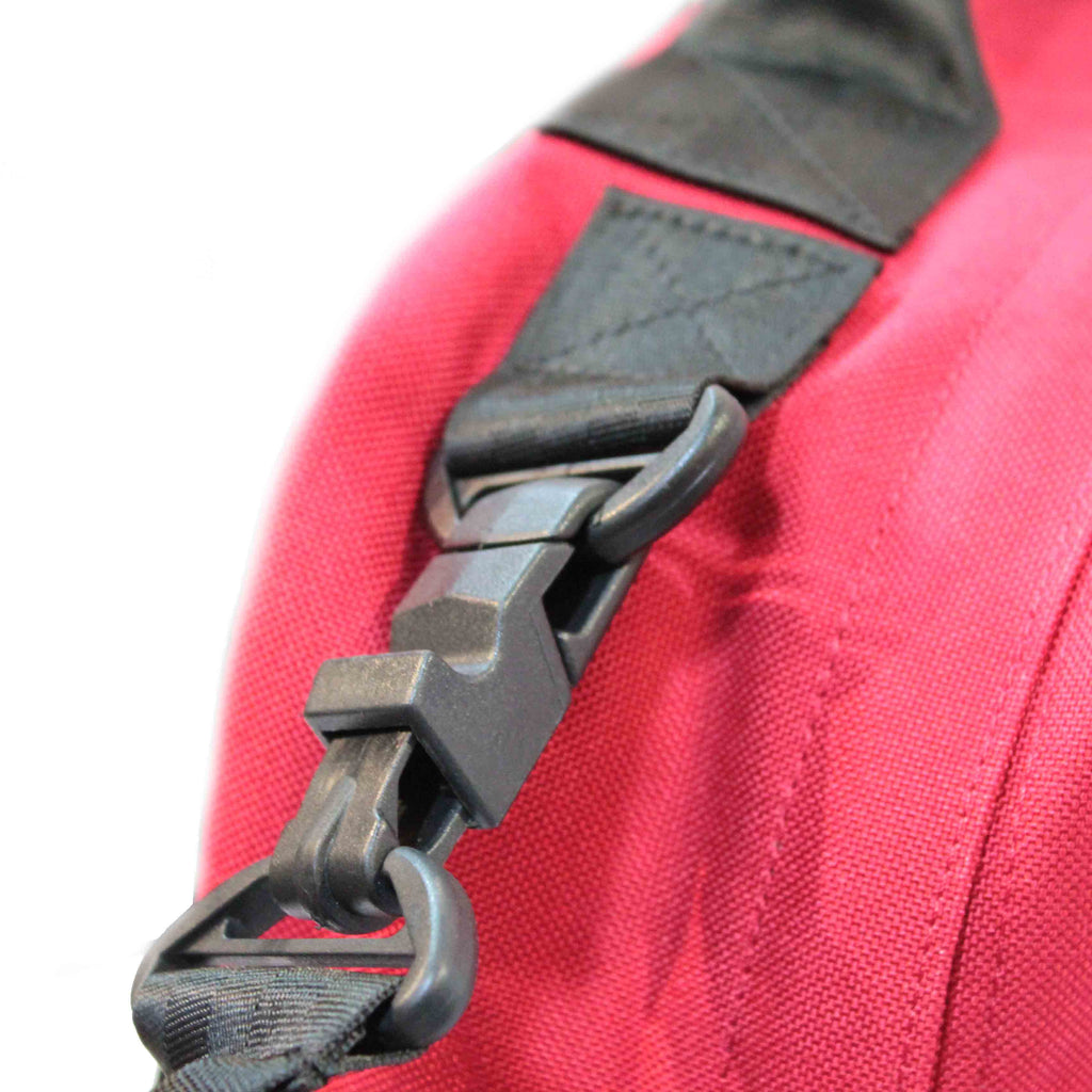 Red emergency medical backpack with reflective strip and Star of Life symbol, designed for first responders and outdoor use.